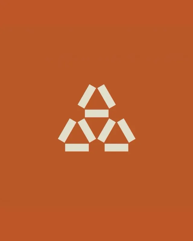 Three-triangle terracotta logo mark, minimal, geometric, earthy