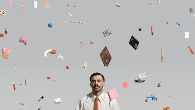 Man under a cloud of floating objects, minimal, photographic, light