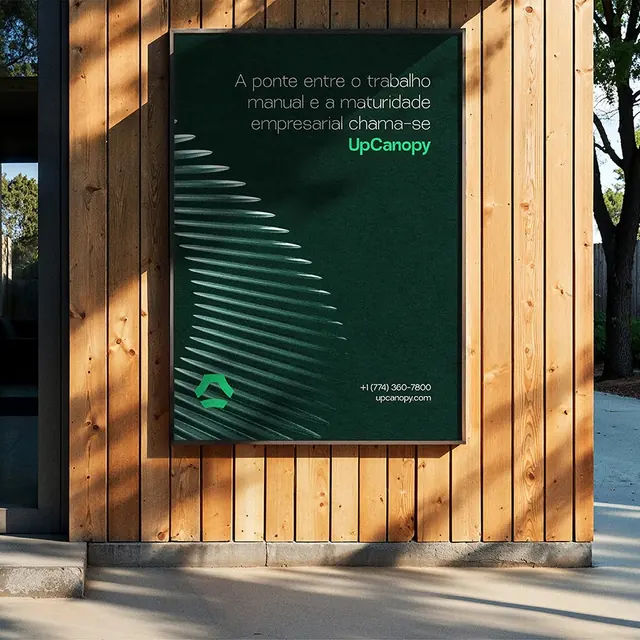 UpCanopy green poster on wood-clad facade, minimal, editorial, earthy
