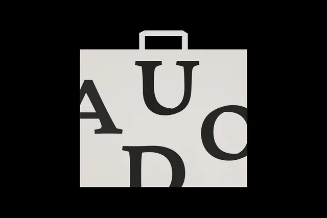 Audo furnishing brand logo on briefcase, minimal, monochrome, monochrome