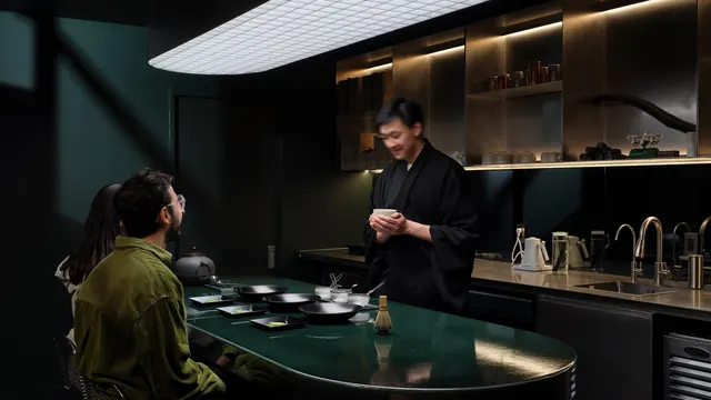 Low-light matcha tasting bar interior, photographic, cinematic, dark