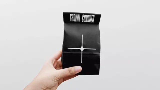 CROWN + CONQUER black bag packaging, minimal, monochrome, dark