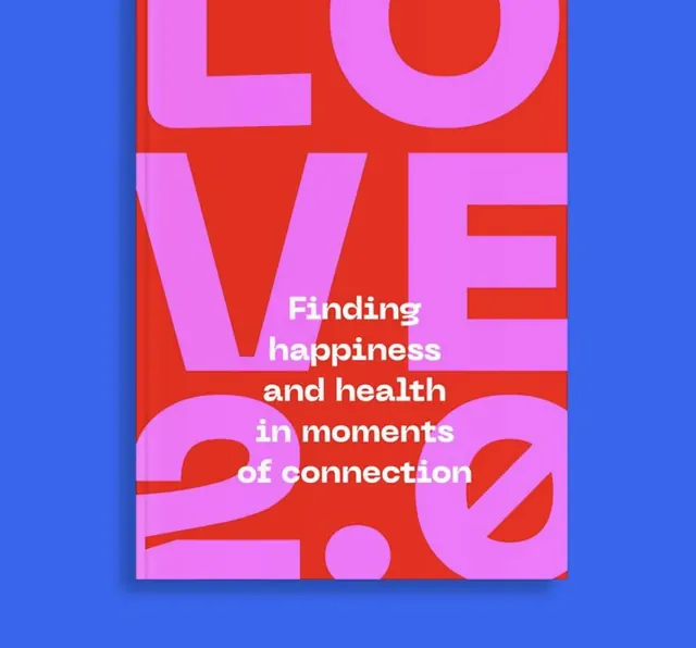 LOVE 2.0 book cover, pink type on red, minimal, editorial, warm