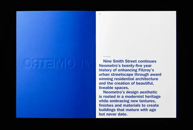 Neometro brand booklet spread with debossed cover and bold body copy, minimal, editorial, vibrant