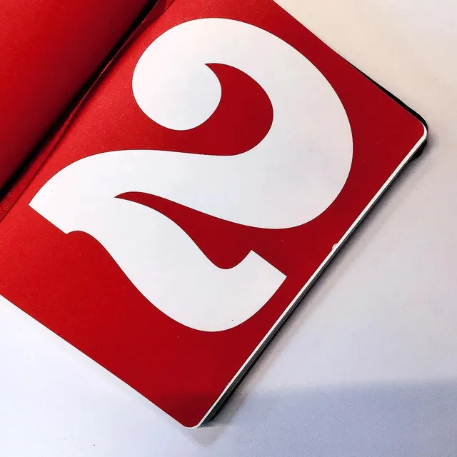 Red and white abstract wave or hands icon, minimal, geometric, vibrant