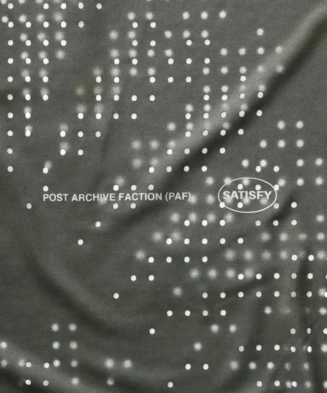 Perforated technical apparel logo lockup, minimal, technical, dark