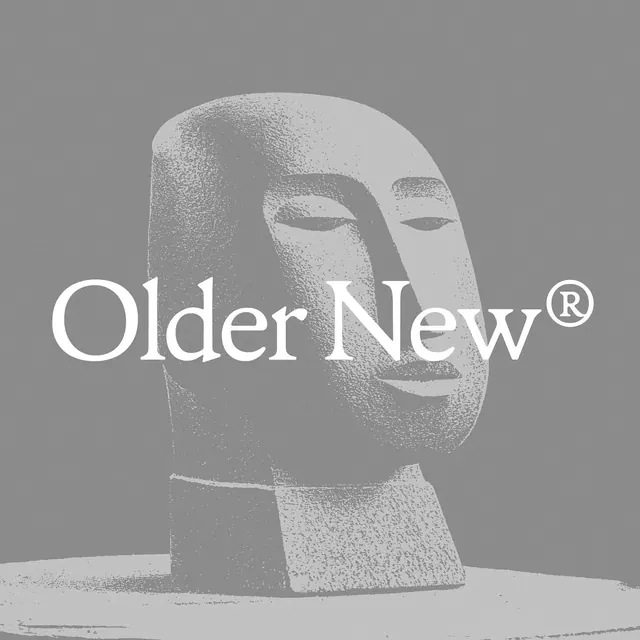 Older New serif logo over carved stone head, minimal, monochrome, monochrome