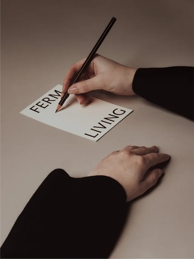 ferm LIVING hand-lettering brand photograph, minimal, editorial, warm