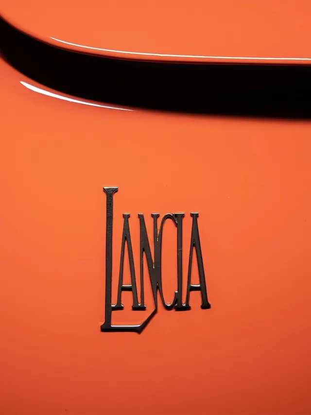 Lancia Wordmark on Orange Surface