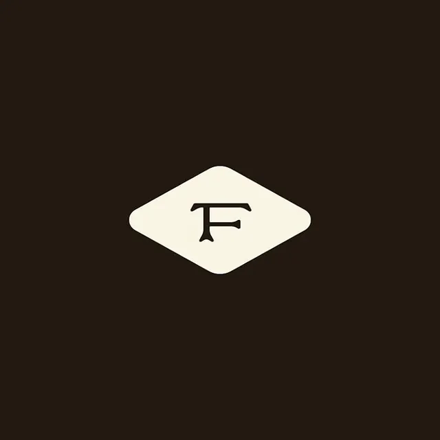 F monogram in cream diamond badge, minimal, geometric, dark