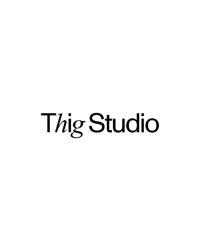 Thig Studio serif wordmark, minimal, monochrome, dark