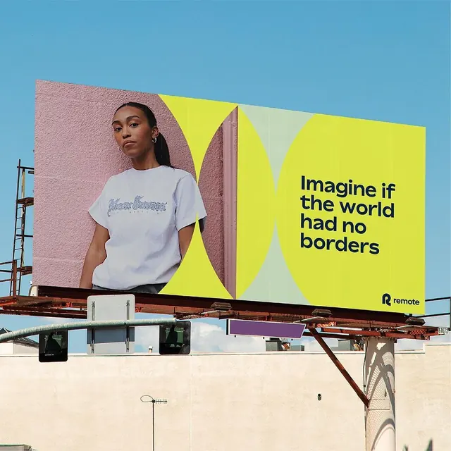 Remote outdoor billboard with geometric color blocking, minimal, editorial, vibrant
