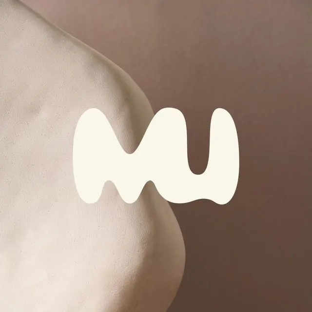 Flowing white abstract wordmark on warm paper, abstract, organic, light