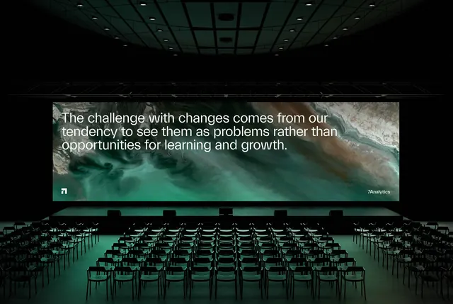 7Analytics auditorium screen slide, minimal, cinematic, dark