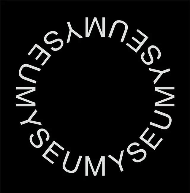 Circular typographic mark, minimal, geometric, dark