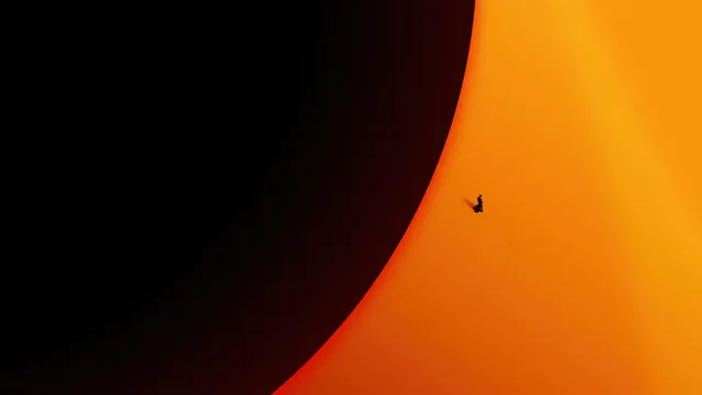 Black-to-orange diagonal split with silhouette, abstract, minimal, dark