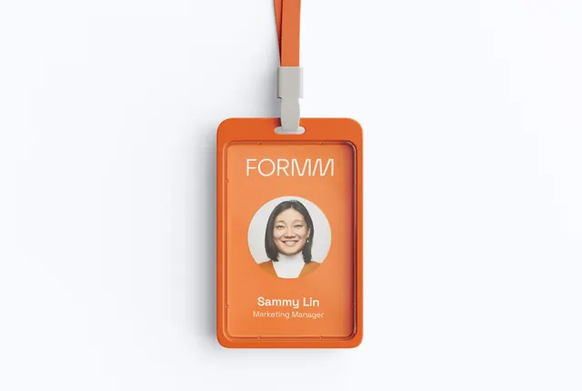 FORM/N warm orange ID badge system, corporate-clean, minimal, warm