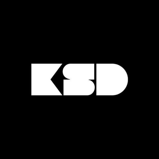 Letterform logo with geometric negative space (KBD), minimal, geometric, dark