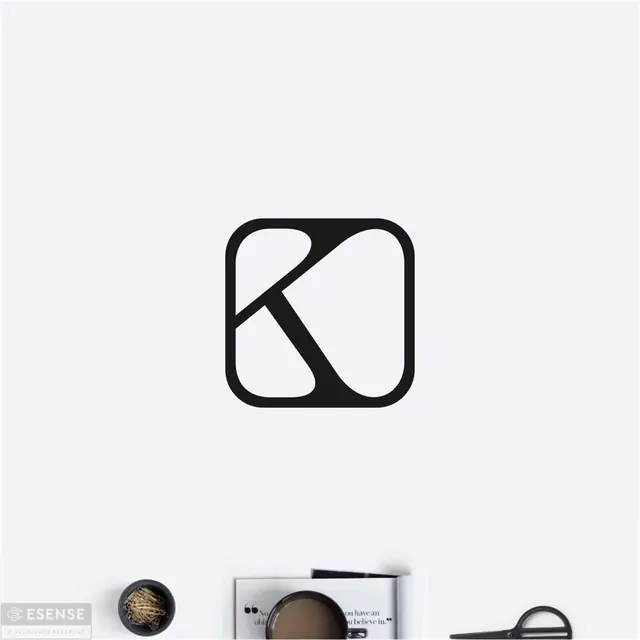 Negative-space K monogram in rounded square, minimal, geometric, dark