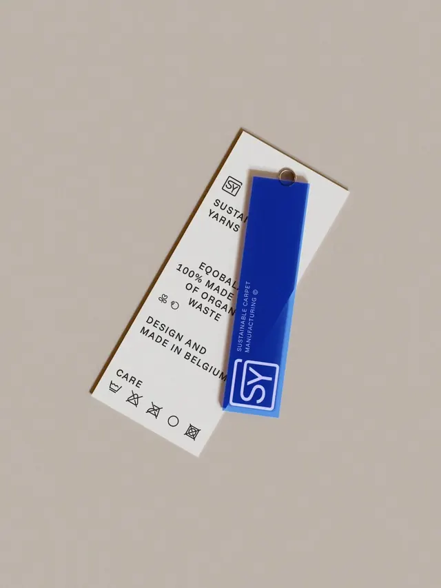 Sustain Yarns product label and blue tag, minimal, organic, light