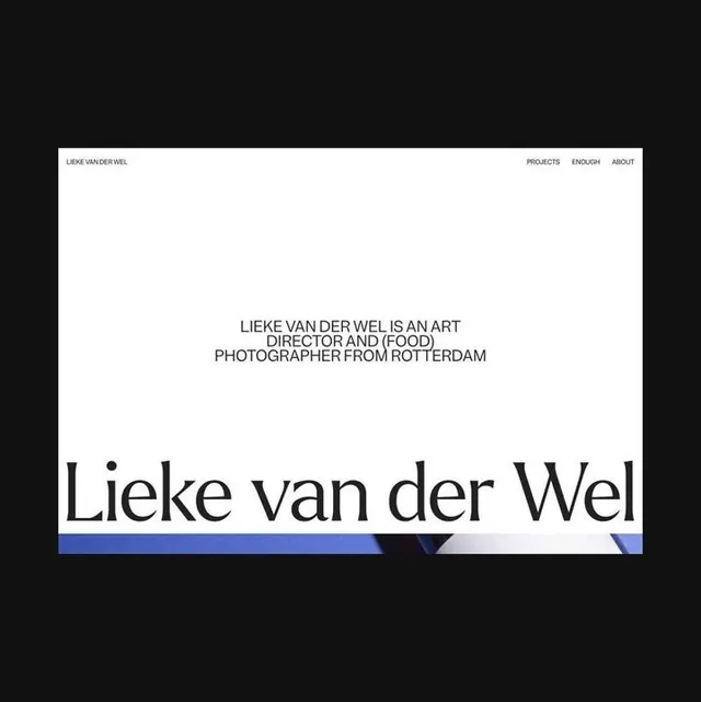 Portfolio website for photographer/art director with bold typographic header, minimal, light-mode, light