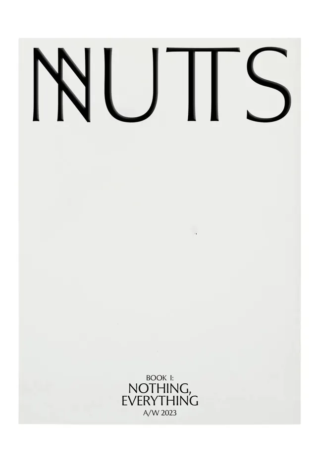 NNNUTS minimalist book cover, minimal, editorial, light