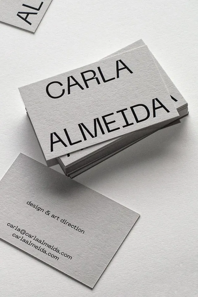 Foiled blocked business cards by Jot Paper Co. for designer/art director Carla Almeida, minimal, monochrome, dark