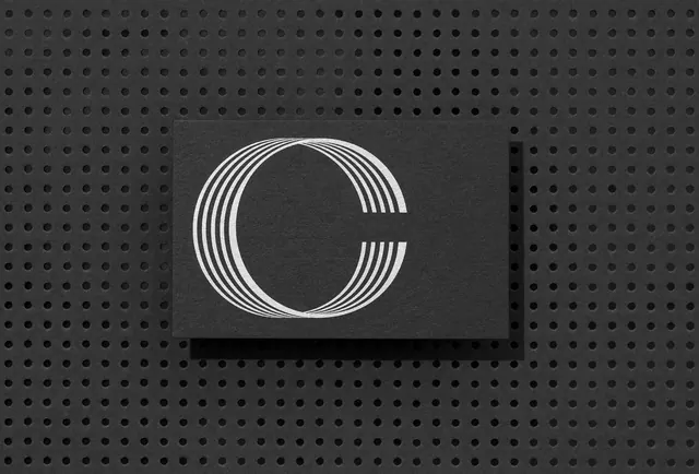 Monogram Logo on Perforated Surface, minimal, geometric, monochrome