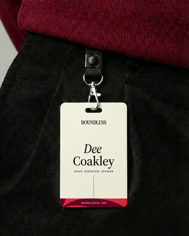 Cream hang tag with minimal type on dark apparel, minimal, corporate-clean, light