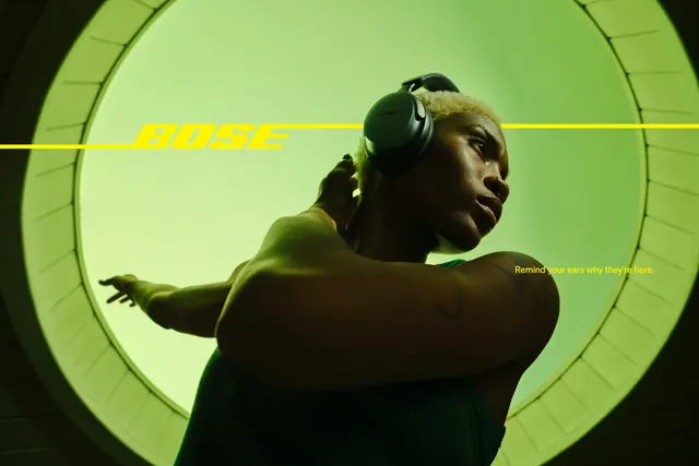 Bose green circle key visual with headphones, cinematic, photographic, vibrant