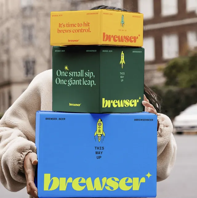 Brewser stacked shipping boxes in yellow, green and blue, flat, playful, vibrant