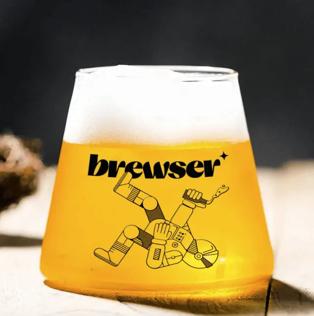 Brewser branded glass with line-art astronaut and hazy pale ale, photographic, line-art, warm
