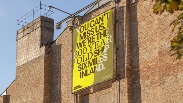 Bristol Dockyards yellow copy-led billboard, typographic, photographic, vibrant