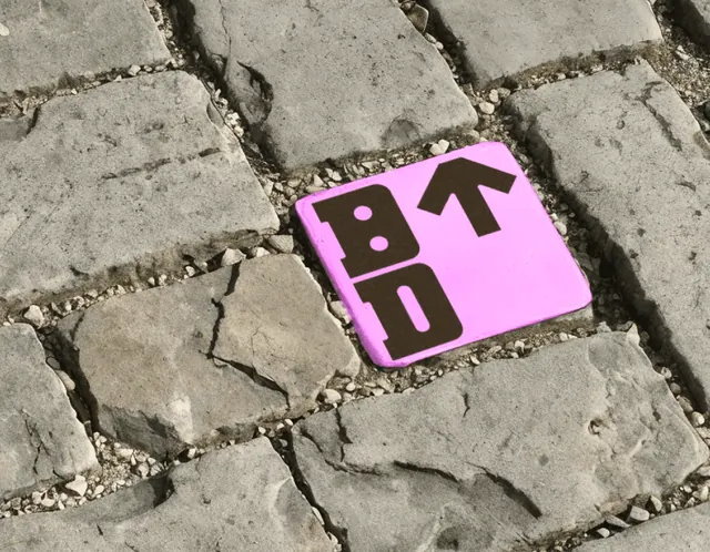 Bristol Dockyards pink wayfinding paver, photographic, minimal, muted