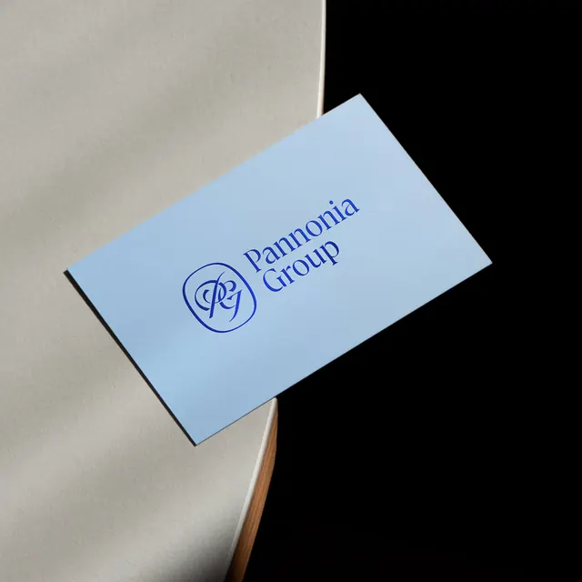 Pannonia Group muted-blue business card, minimal, corporate-clean, dark