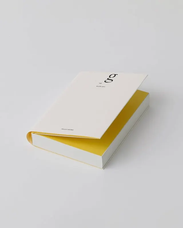 Minimal notebook with gold foil edge and ribbon, minimal, luxury, light