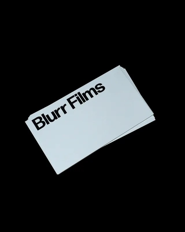 Blurr Films stacked business cards, minimal, swiss, dark