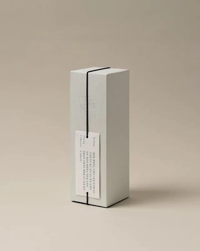 Minimal box packaging with ribbon binding, minimal, brutalist, light