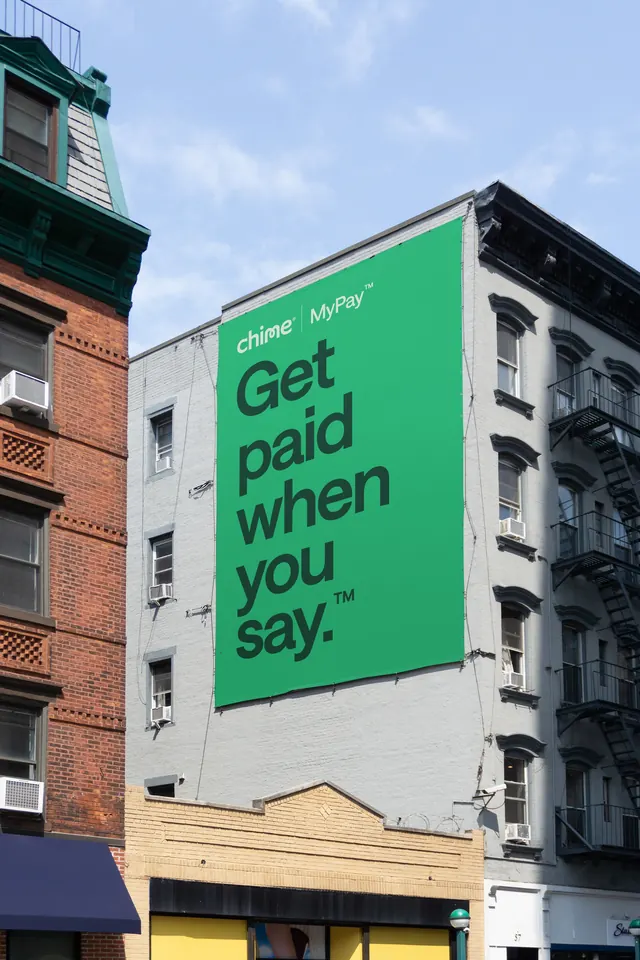 Chime MyPay wall banner on a city building, minimal, typographic, vibrant