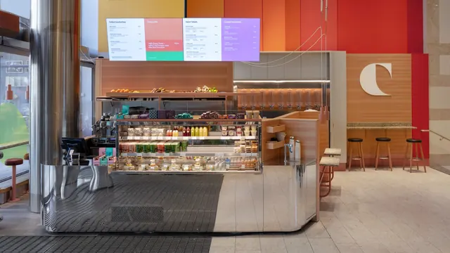 Colorfield store counter and menu wall, architectural, photographic, warm
