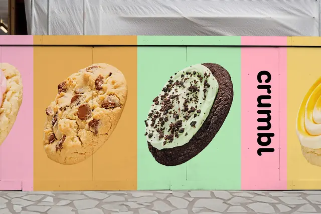 Crumbl color-blocked hoarding with cookie photography, minimal, photographic, pastel