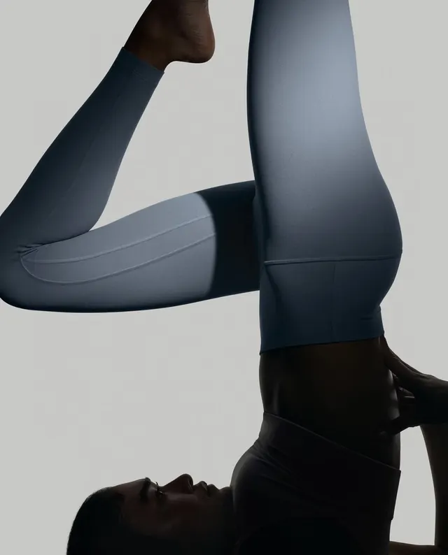 Studio body study in monochromatic blue, minimal, photographic, dark