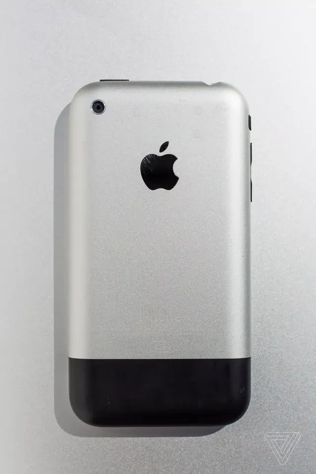 Early iPhone product mockup, minimal, photographic, light