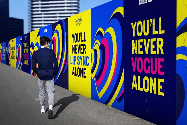 Eurovision 2023 hoarding run with slogan panels, flat, geometric, vibrant