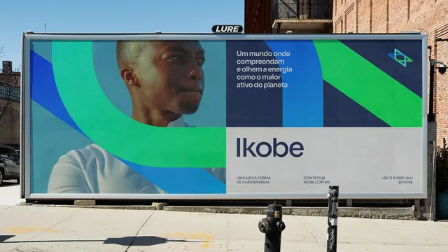 Ikobe energy billboard with curved color panels, geometric, corporate-clean, cool