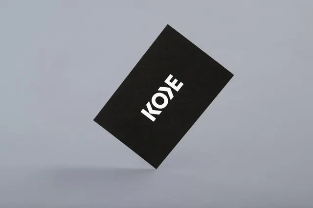 KODE brand identity on rotated card, minimal, swiss, monochrome