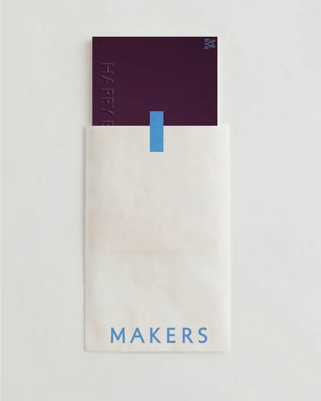 Deep purple and cream stationery system with blue accent, minimal, editorial, light