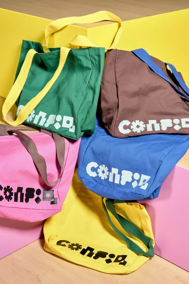 Config 2024 conference totes in five colorways, playful, geometric, vibrant