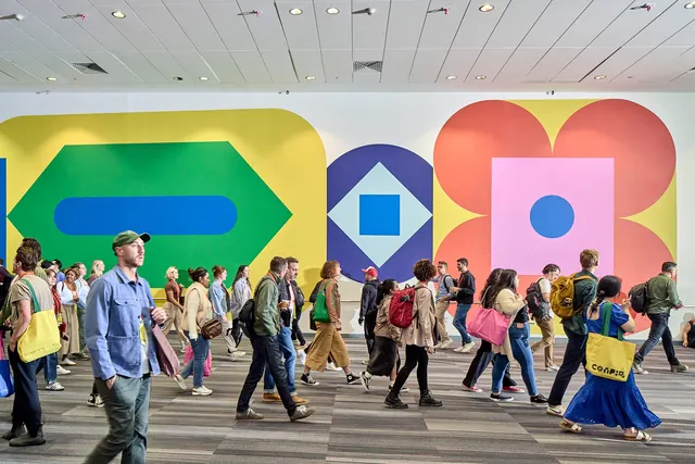 Config 2024 concourse mural with attendees, geometric, flat, vibrant