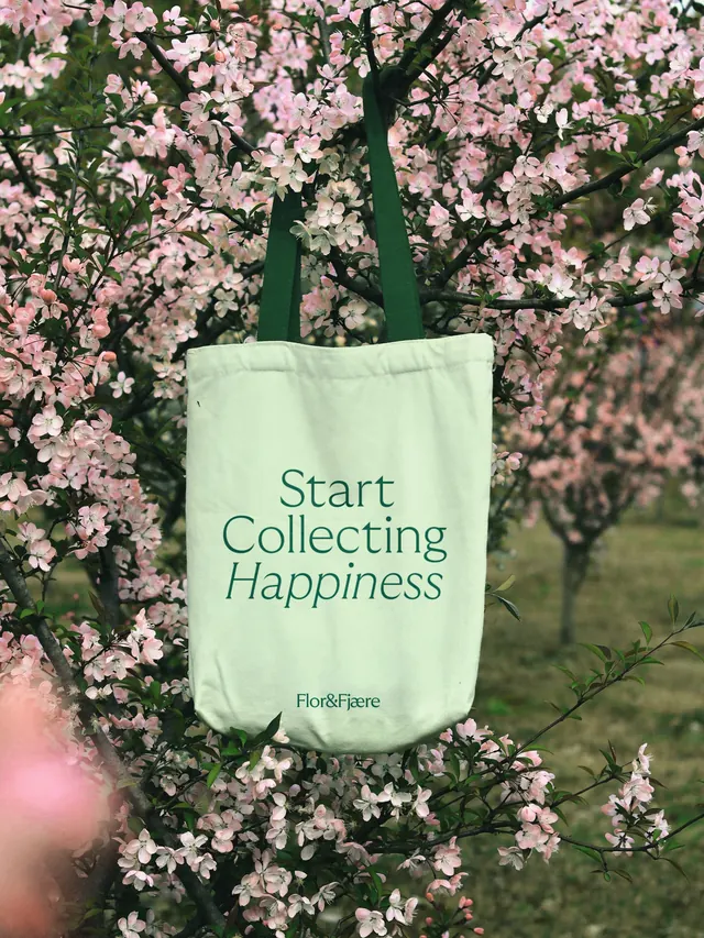 Flor and Fjaere slogan tote in blossom tree, minimal, typographic, pastel
